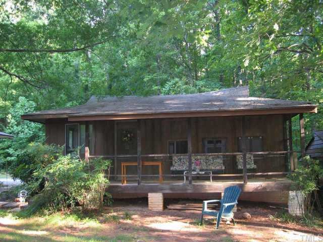 7229 Kemp Road Raleigh, NC 27613 - Photo 2 of 12 a view of backyard with outdoor seating and plants