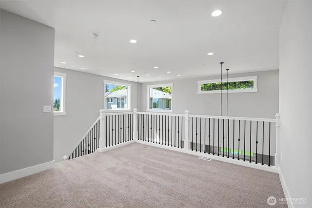 a view of a hallway with a bedroom
