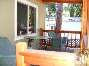 52901 Pine Cove Road, Unit 22 Idyllwild, CA 92549 - Photo 2 of 15 a view of a dining room with furniture and window