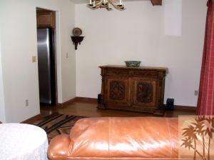 52901 Pine Cove Road, Unit 22 Idyllwild, CA 92549 - Photo 3 of 15 a bed sitting in a room next to a window