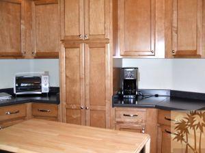 52901 Pine Cove Road, Unit 22 Idyllwild, CA 92549 - Photo 9 of 15 a kitchen with stainless steel appliances granite countertop a refrigerator and a stove top oven