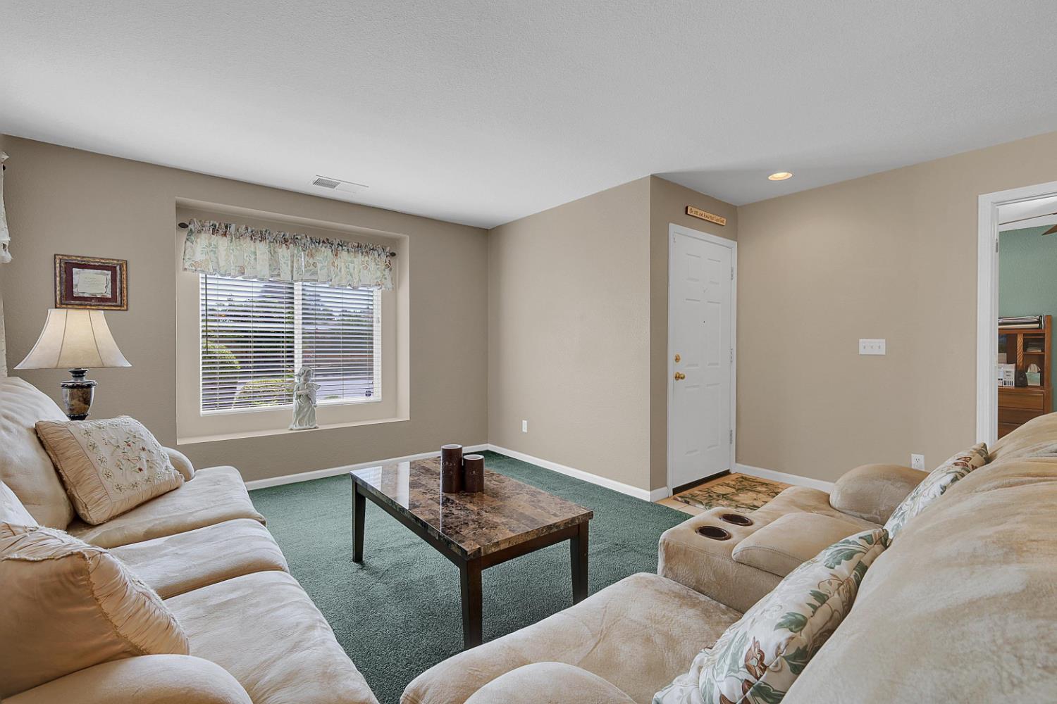 9840 Ellis Way Live Oak, CA 95953 - Photo 6 of 44 a living room with furniture and a window