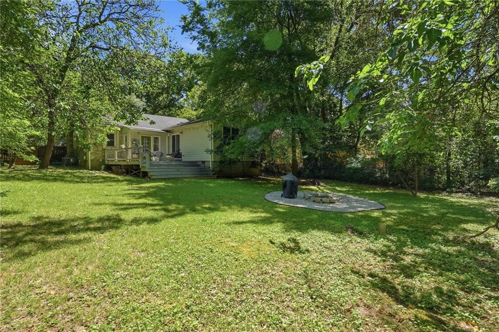 385 Sunset Drive Athens, GA 30606 - Photo 39 of 48 a view of a house with a yard