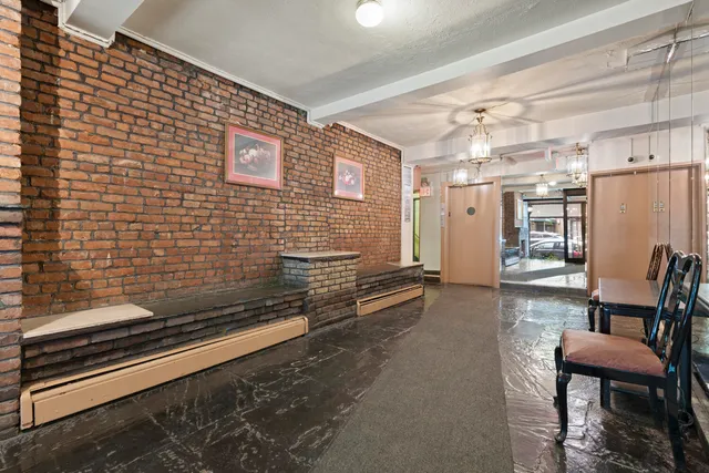 a view of a chairs and table in a room