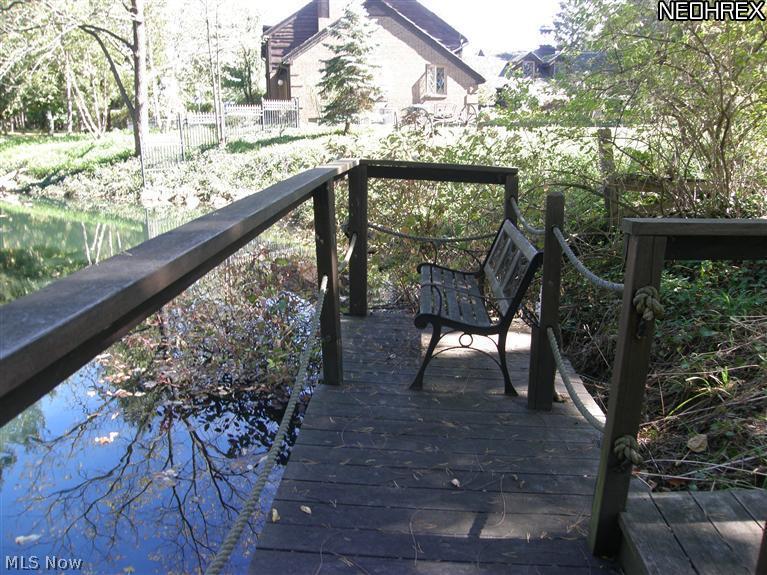 7243 Chillicothe Road Mentor, OH 44060 - Photo 19 of 23 This is your bench. Just sit here and enjoy the pond. Or paddle in it.