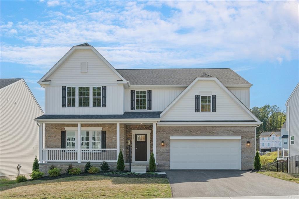 264 Rylie Drive Harmony, PA 16037 - Photo 1 of 31 a front view of a house with a garden