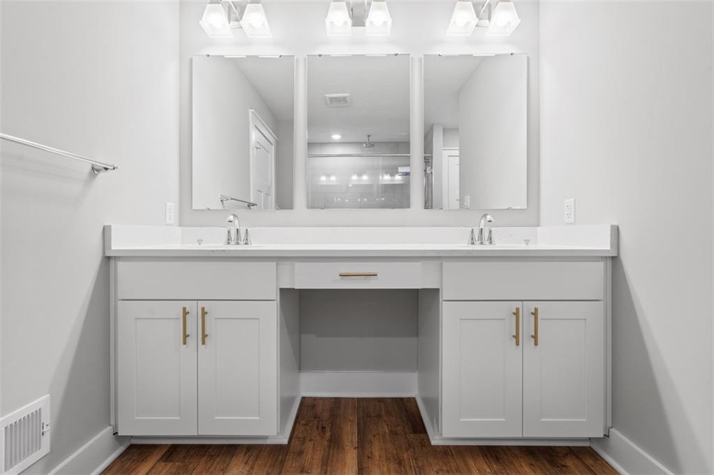 264 Rylie Drive Harmony, PA 16037 - Photo 16 of 31 a bathroom with a sink double vanity and a mirror