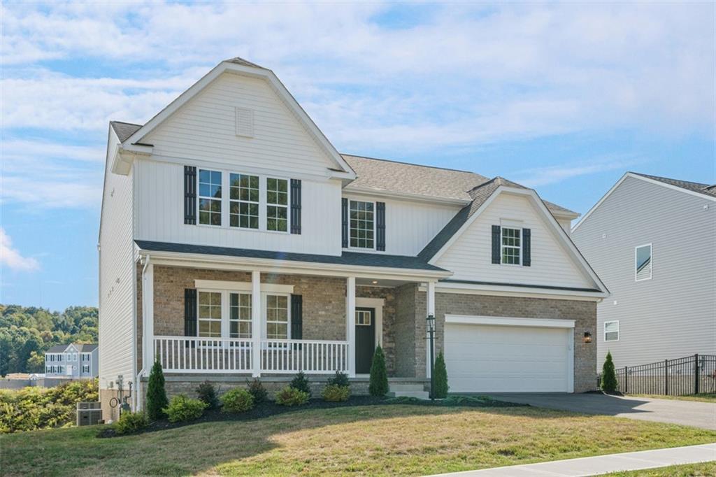 264 Rylie Drive Harmony, PA 16037 - Photo 2 of 31 a front view of a house with a yard