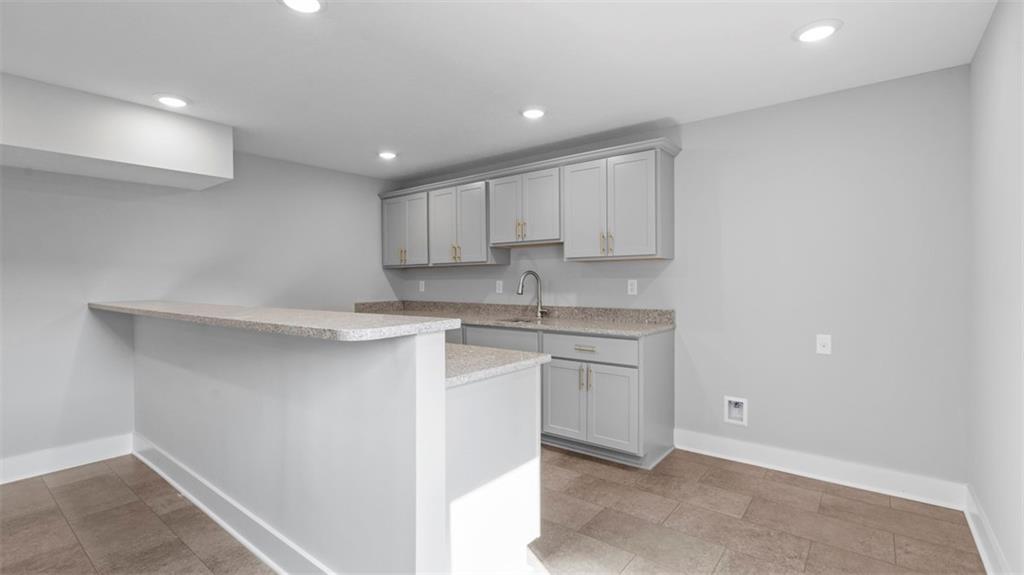 264 Rylie Drive Harmony, PA 16037 - Photo 26 of 31 a kitchen with white cabinets appliances and a sink