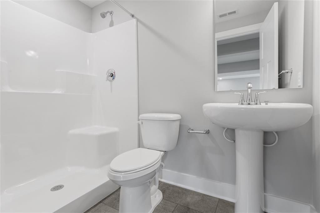 264 Rylie Drive Harmony, PA 16037 - Photo 29 of 31 a bathroom with a sink toilet and shower