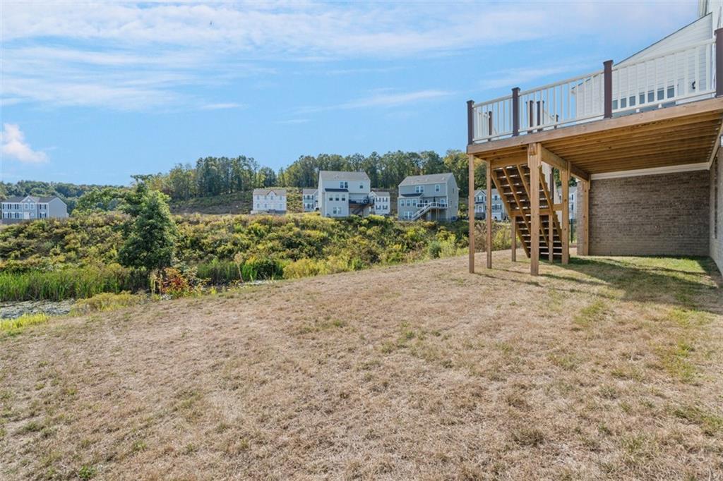 264 Rylie Drive Harmony, PA 16037 - Photo 30 of 31 a view of a house with a yard