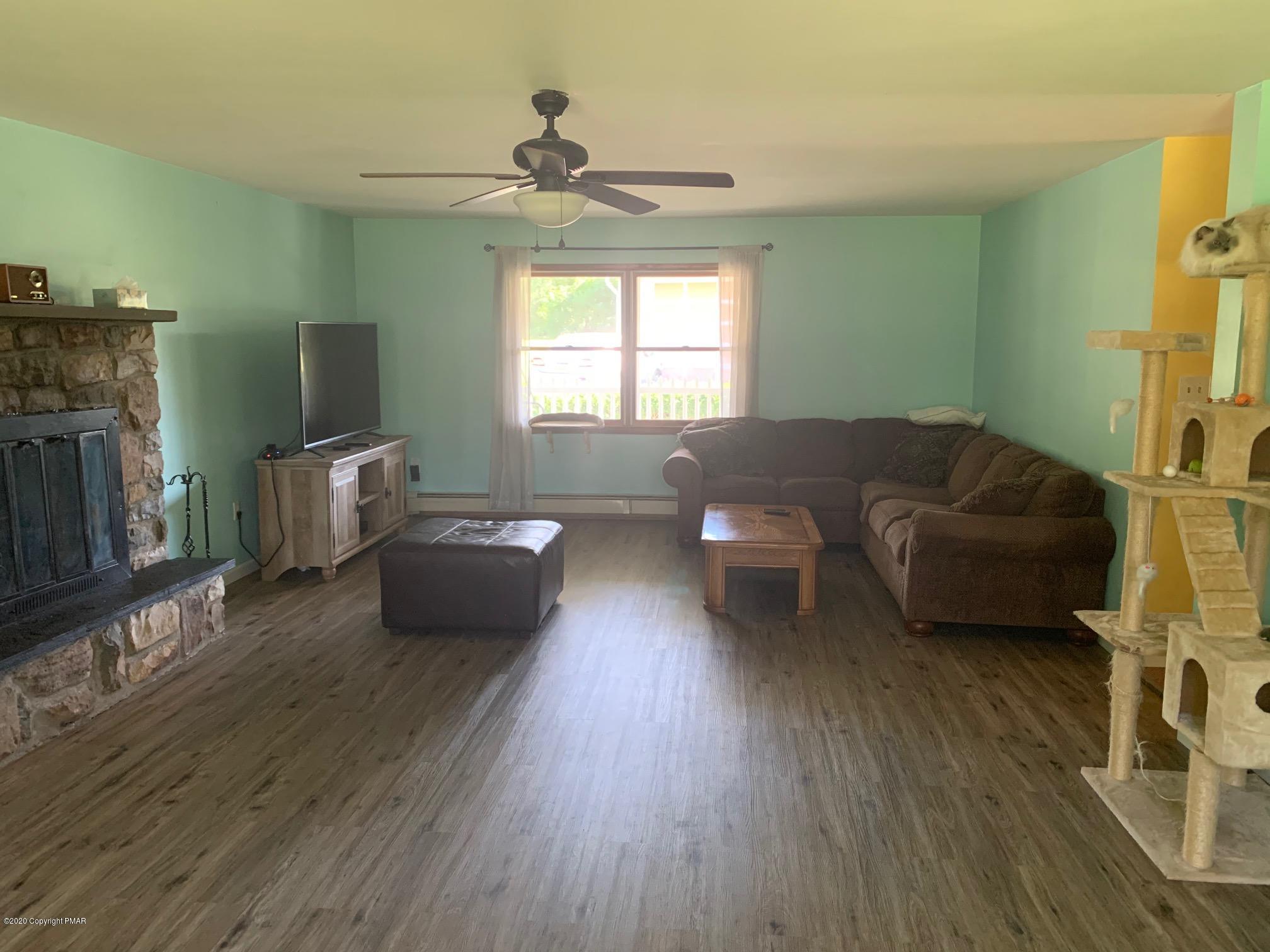 2806 Peach Road Kunkletown, PA 18058 - Photo 5 of 27 a living room with furniture and a flat screen tv