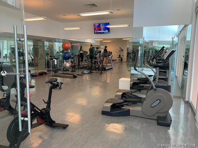 a bathroom with a tub and shower