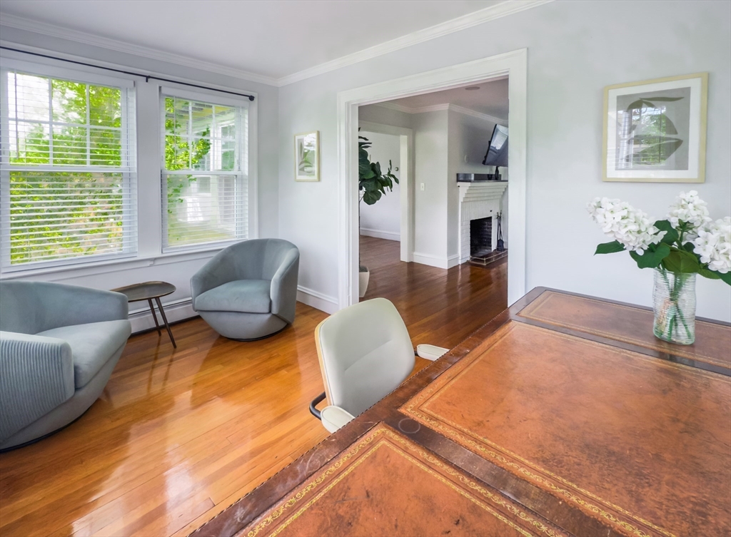 65-67 St James Circle, Unit 2 Newton, MA 02458 - Photo 5 of 29 a living room with furniture and a large window