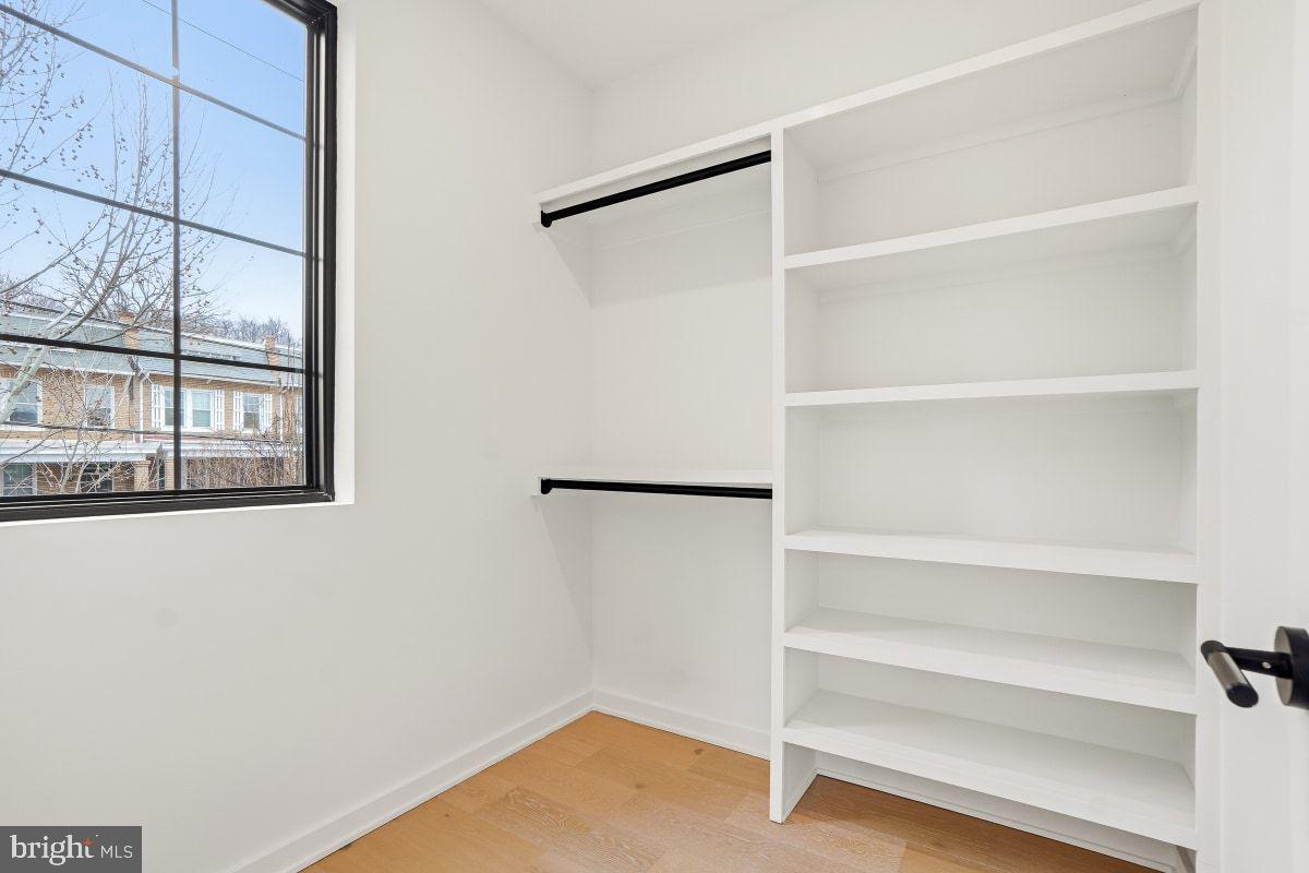 3554 T Street Northwest Washington, DC 20007 - Photo 33 of 57 a view of walk in closet with empty racks