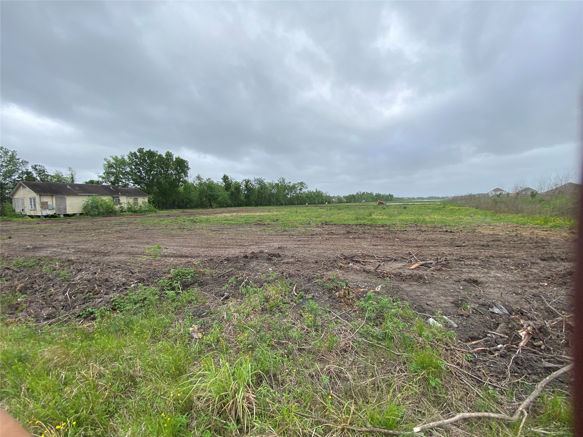 1222 County Road 58 Rosharon, TX 77583 - Photo 3 of 6 a view of a field with trees in background