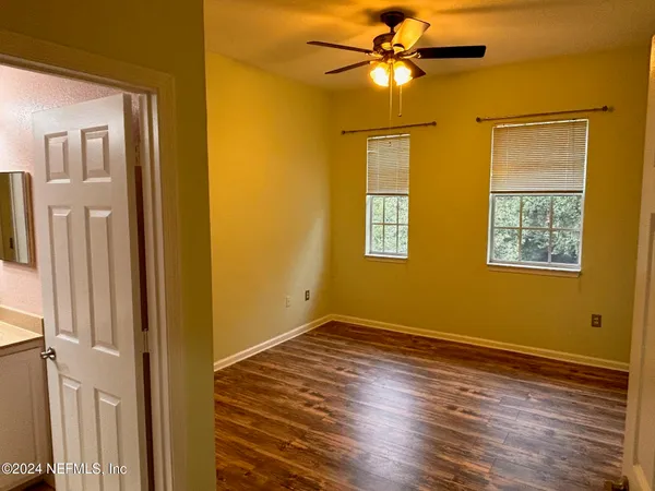 a view of entryway with wooden floor