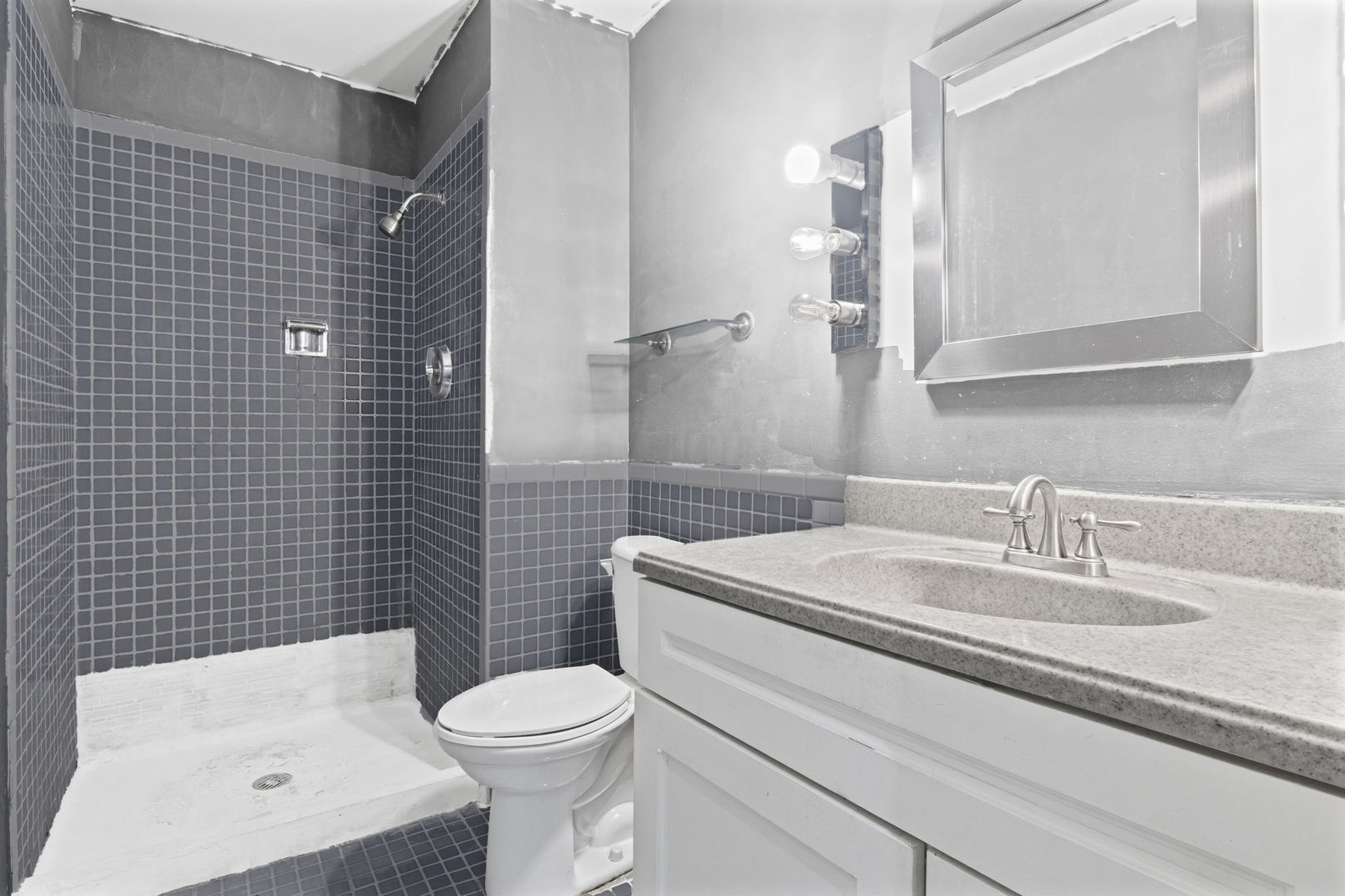 6033 North Sheridan Road, Unit 10D Chicago, IL 60660 - Photo 19 of 24 a bathroom with a sink a toilet and shower