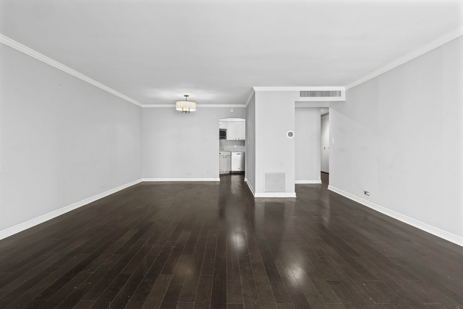 6033 North Sheridan Road, Unit 10D Chicago, IL 60660 - Photo 8 of 24 a view of empty room with wooden floor