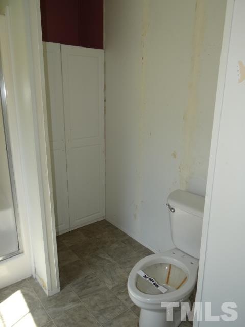 15 Beaver Run Road Spring Hope, NC 27882 - Photo 8 of 12 a bathroom with a sink and a toilet