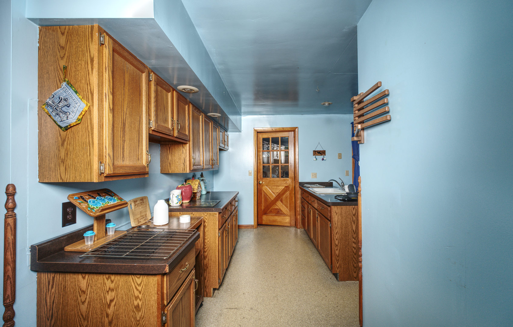 9896 Lincoln Road Morrison, IL 61270 - Photo 14 of 38 a kitchen filled with stainless steel appliances granite countertop a sink stove and cabinets