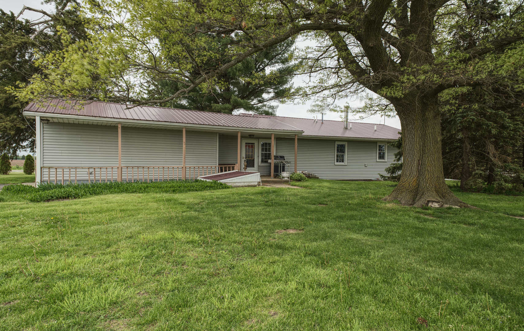 9896 Lincoln Road Morrison, IL 61270 - Photo 4 of 38 a front view of house with yard and trees