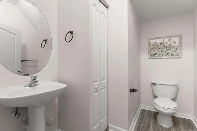 a view of a kitchen with a sink and a chandelier