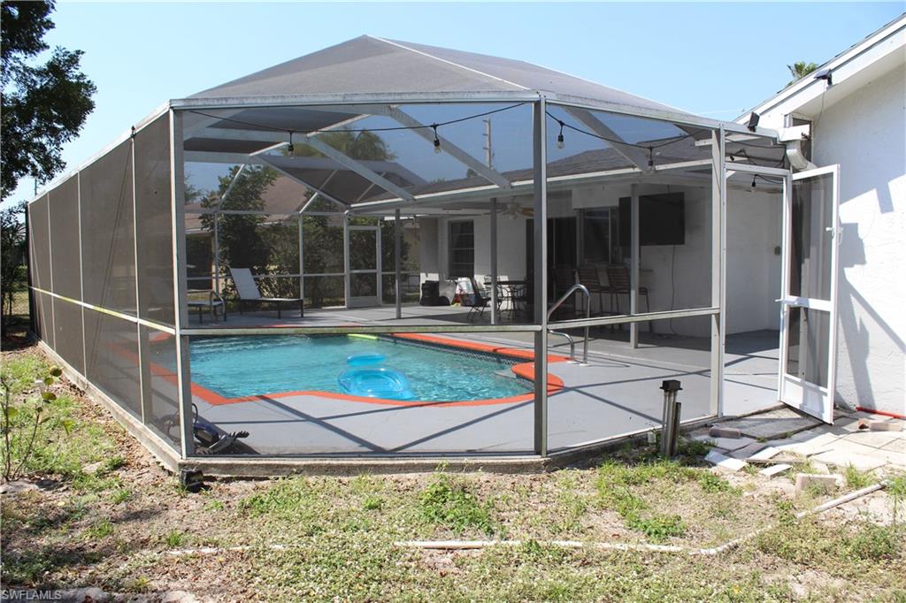 7328 Pebble Beach Road Fort Myers, FL 33967 - Photo 28 of 31 a view of a house with backyard
