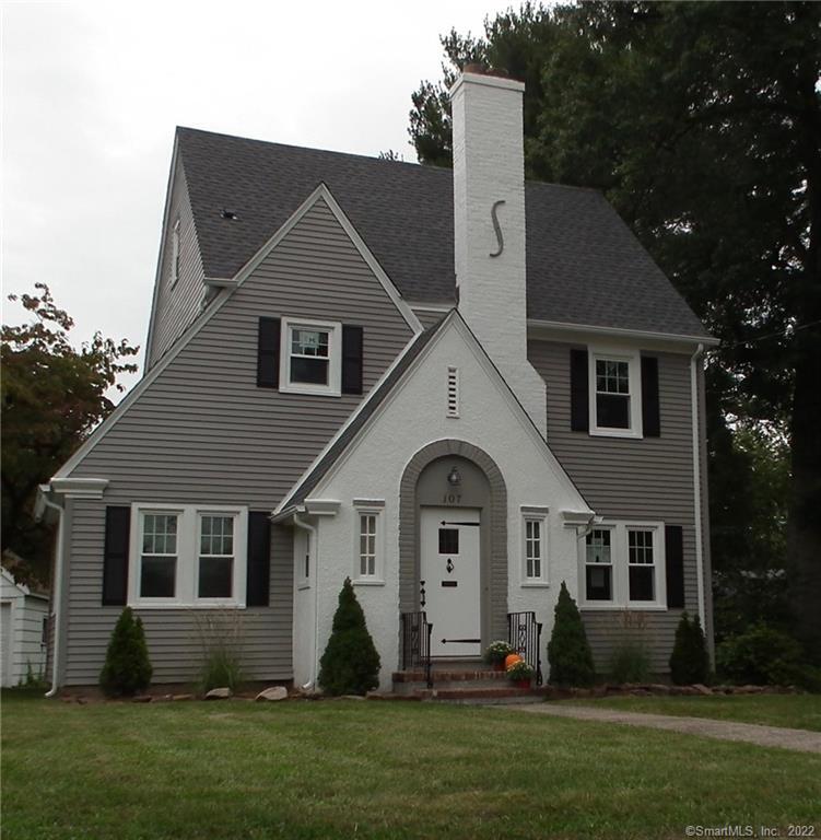 107 Pendleton Road New Britain, CT 06053 - Photo 1 of 1 a front view of a house with a yard and trees