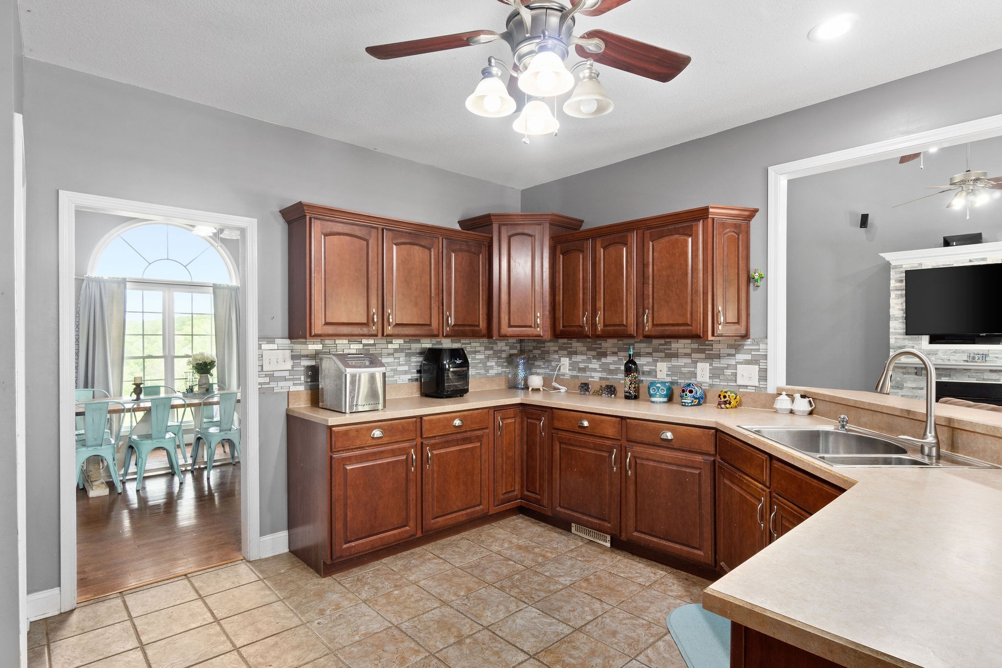 2458 Carroll Road Palmyra, TN 37142 - Photo 15 of 35 a kitchen with cabinets a sink and appliances