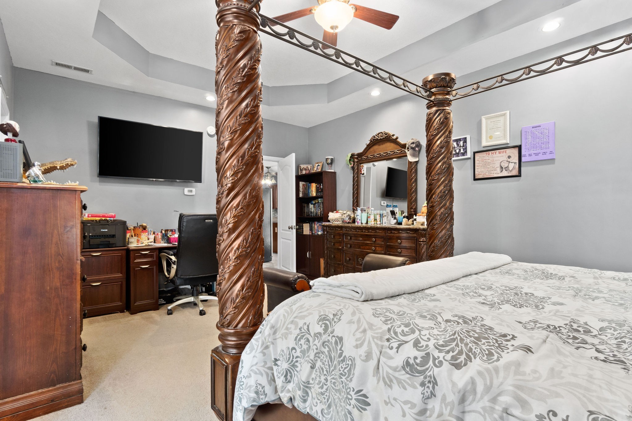 2458 Carroll Road Palmyra, TN 37142 - Photo 19 of 35 a bedroom with a bed and a flat screen tv