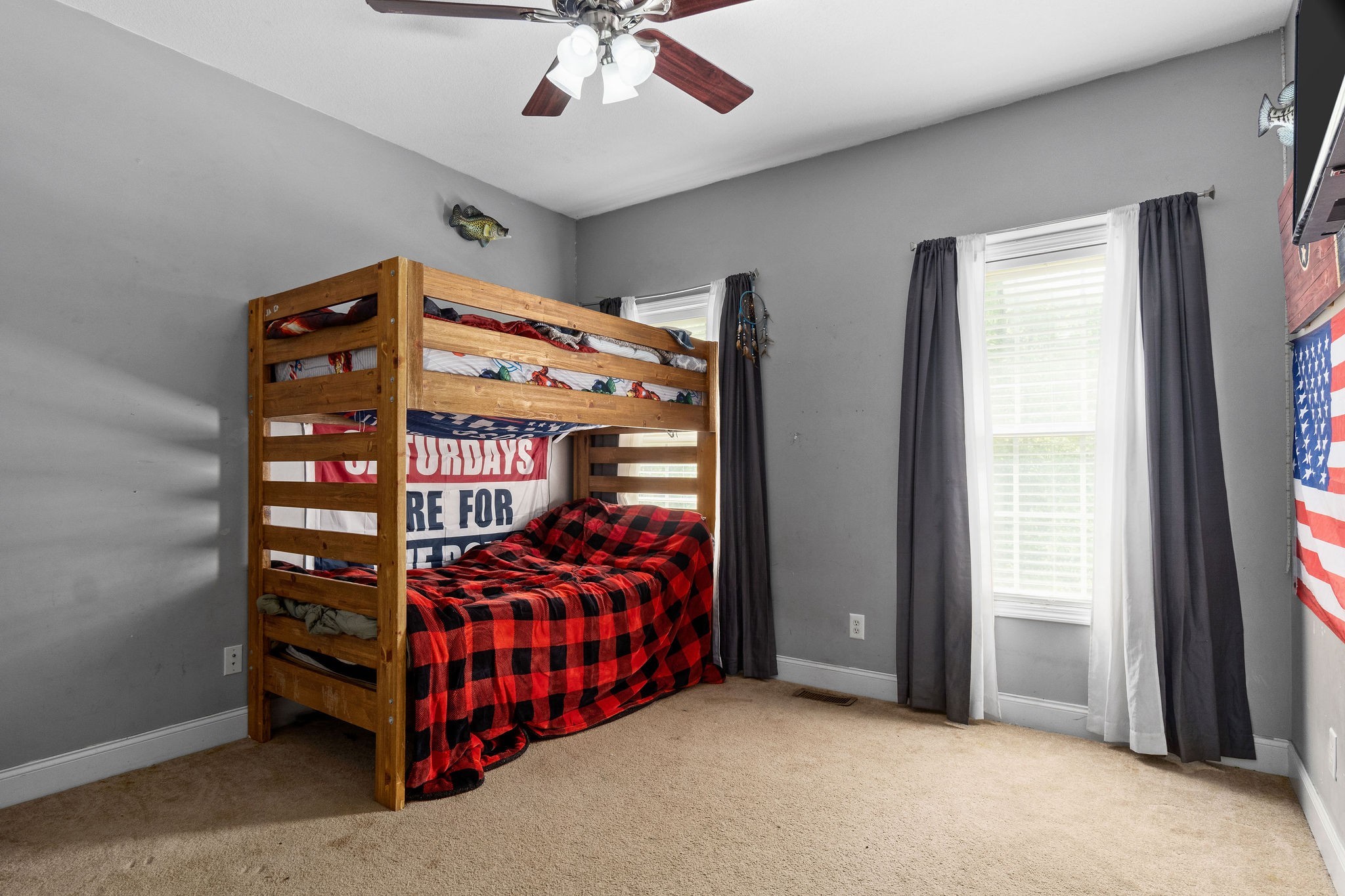 2458 Carroll Road Palmyra, TN 37142 - Photo 24 of 35 a bedroom with a bed and a chandelier