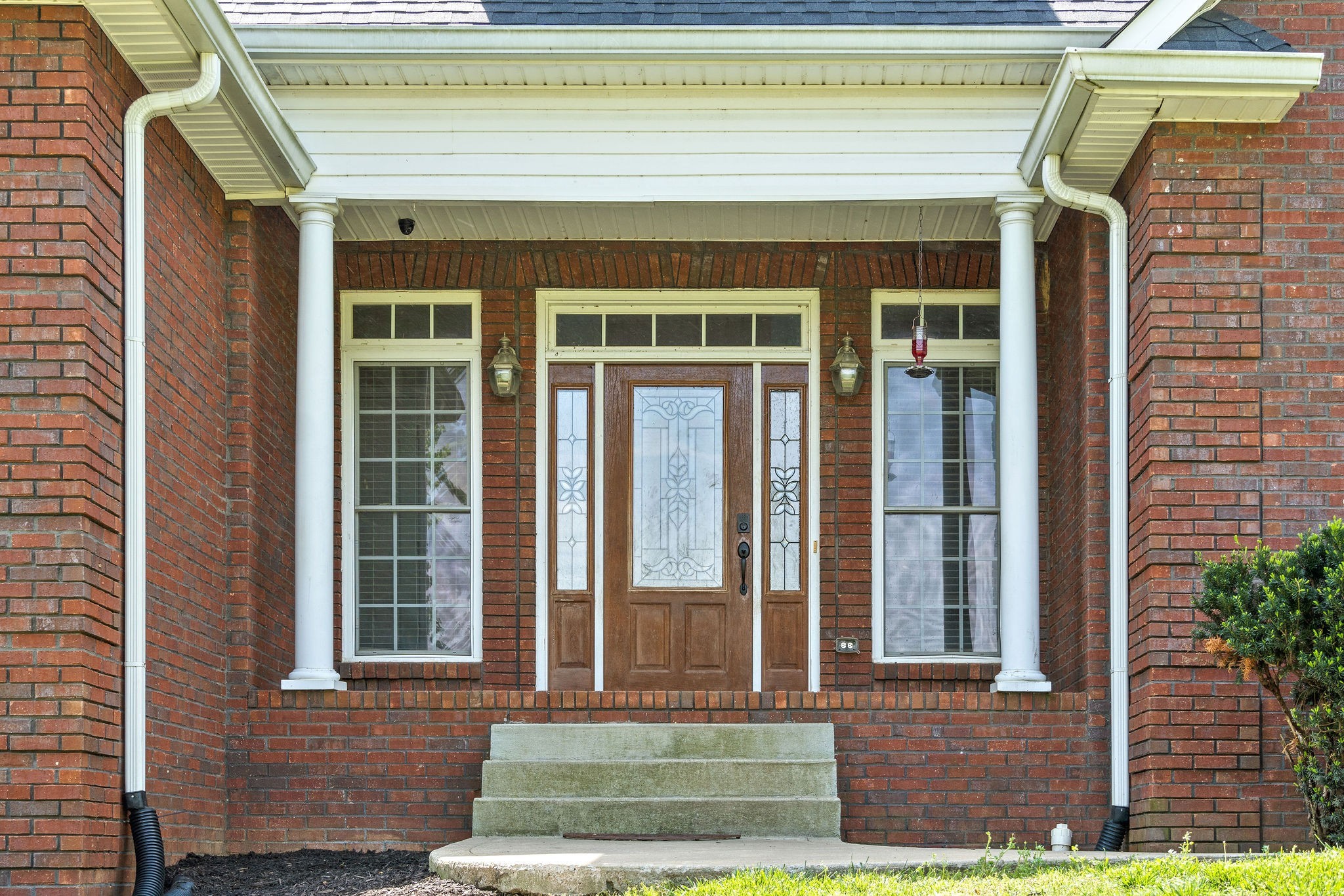 2458 Carroll Road Palmyra, TN 37142 - Photo 3 of 35 a front view of a house with a yard