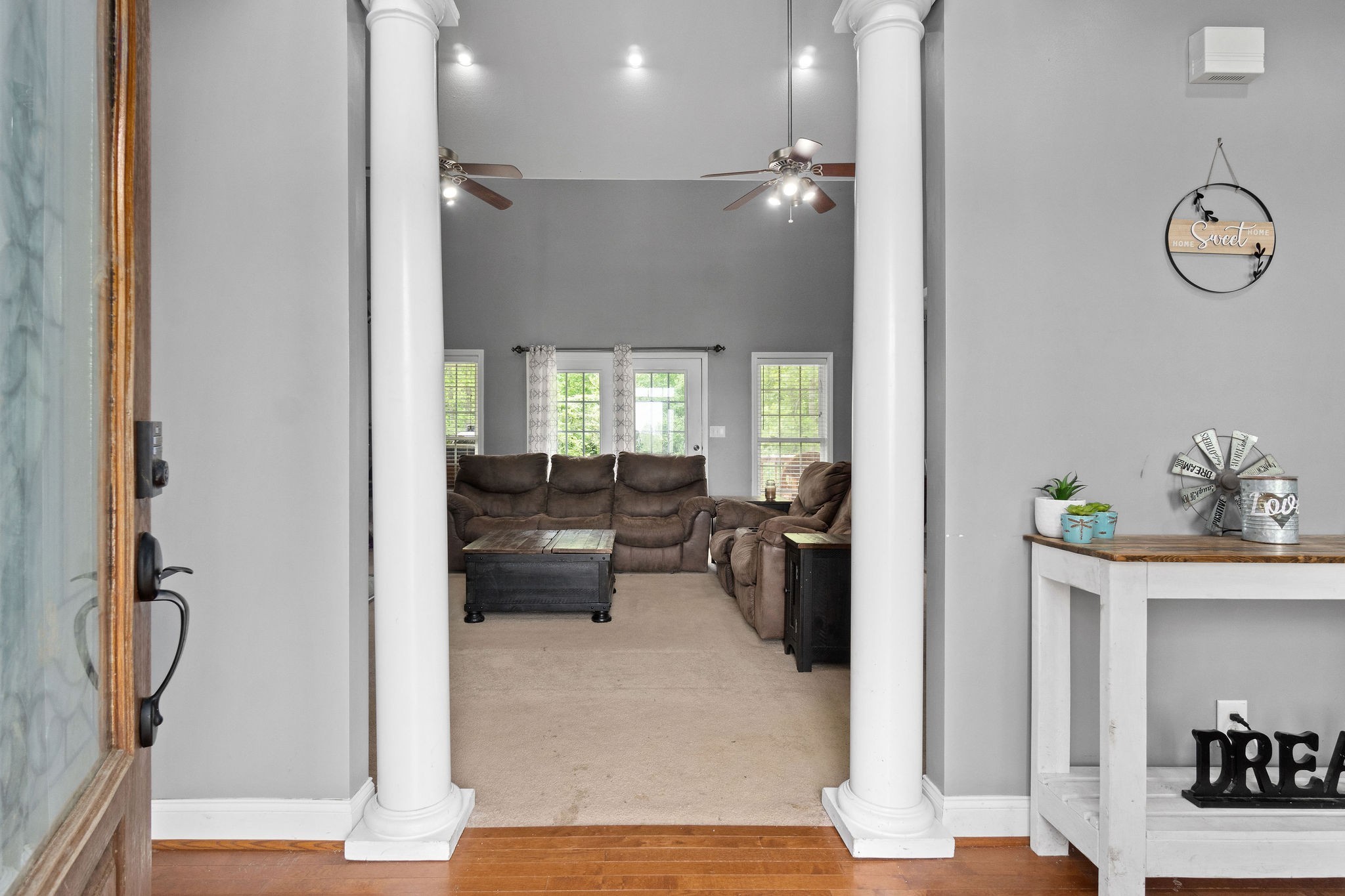 2458 Carroll Road Palmyra, TN 37142 - Photo 4 of 35 a view of living room kitchen and patio
