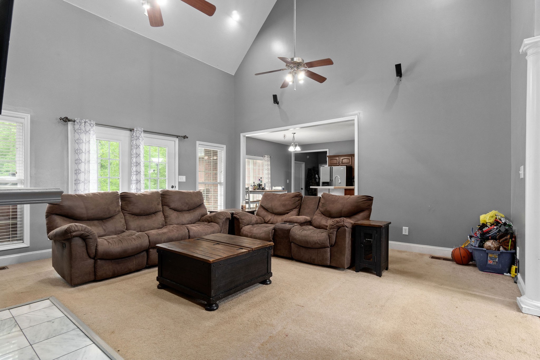 2458 Carroll Road Palmyra, TN 37142 - Photo 6 of 35 a living room with furniture and a chandelier