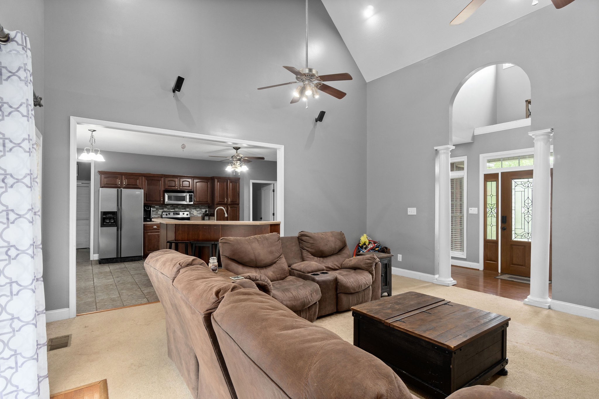 2458 Carroll Road Palmyra, TN 37142 - Photo 7 of 35 a living room with furniture and a wooden floor