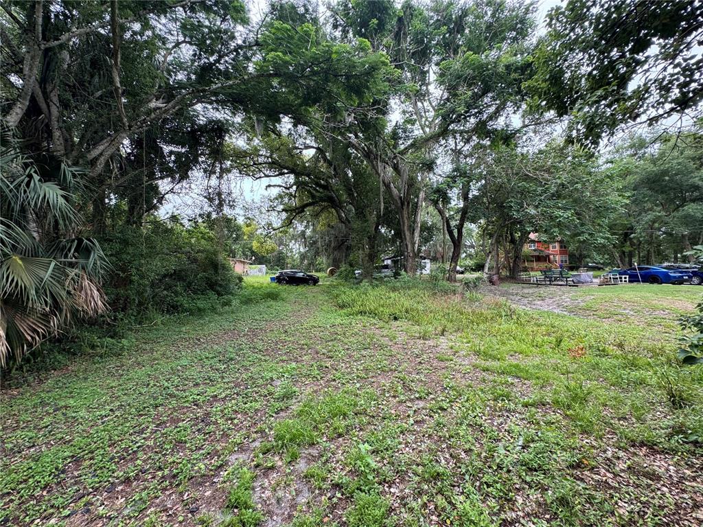 121 East Street Altamonte Springs, FL 32701 - Photo 2 of 4 a view of outdoor space with deck and yard