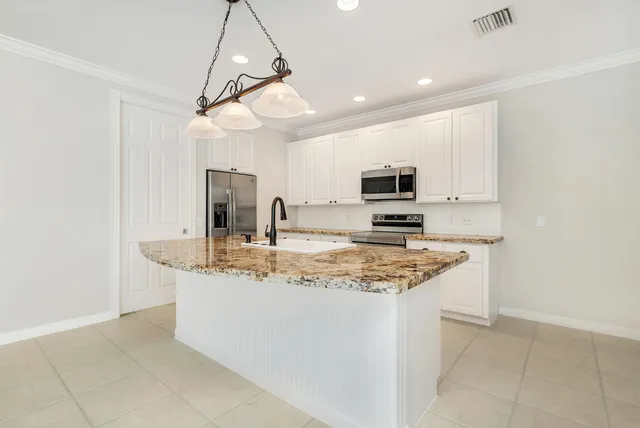 $9,000 | 130 Poinciana Drive, Jupiter, FL 33458