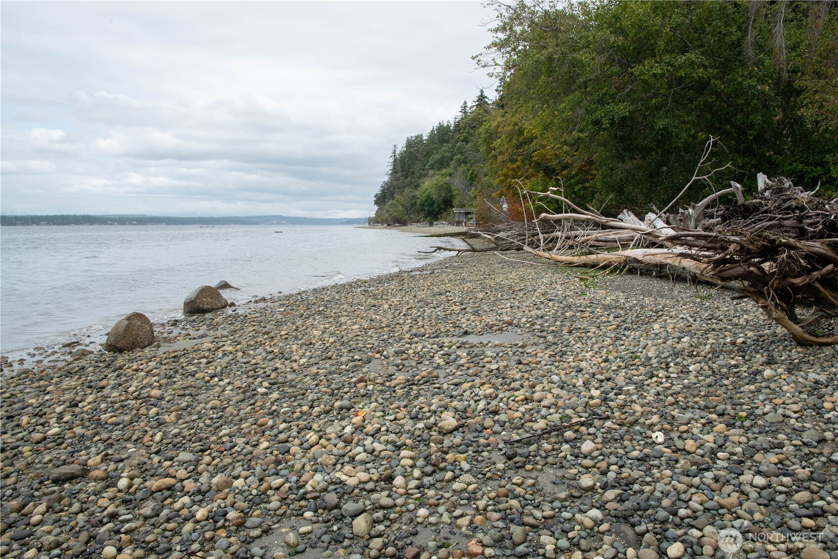 6206 Crescent Beach Road Vaughn, WA 98394 - Photo 3 of 22 a view of a backyard of the house