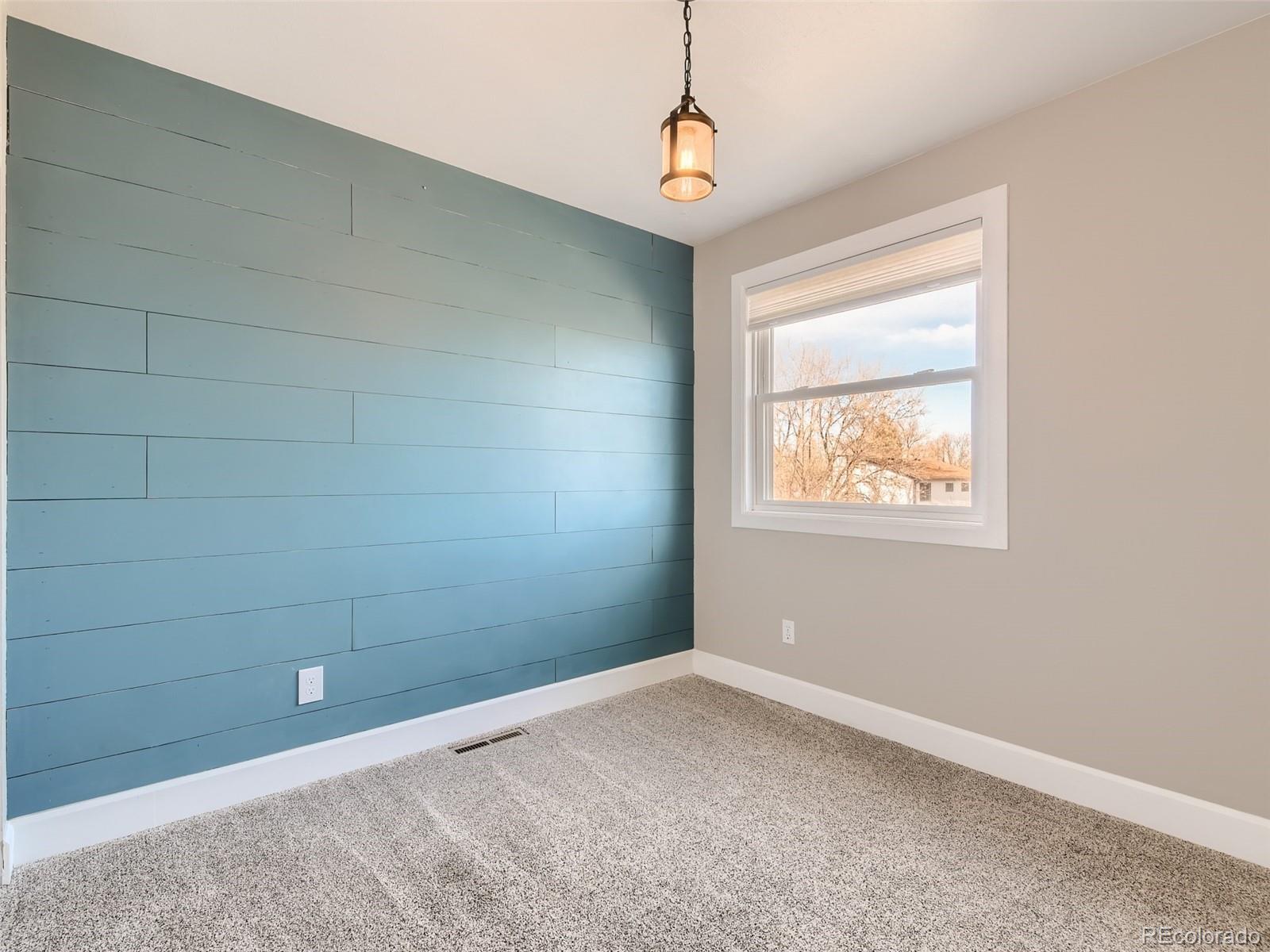 10390 Owens Circle Westminster, CO 80021 - Photo 16 of 28 a view of an empty room with a window