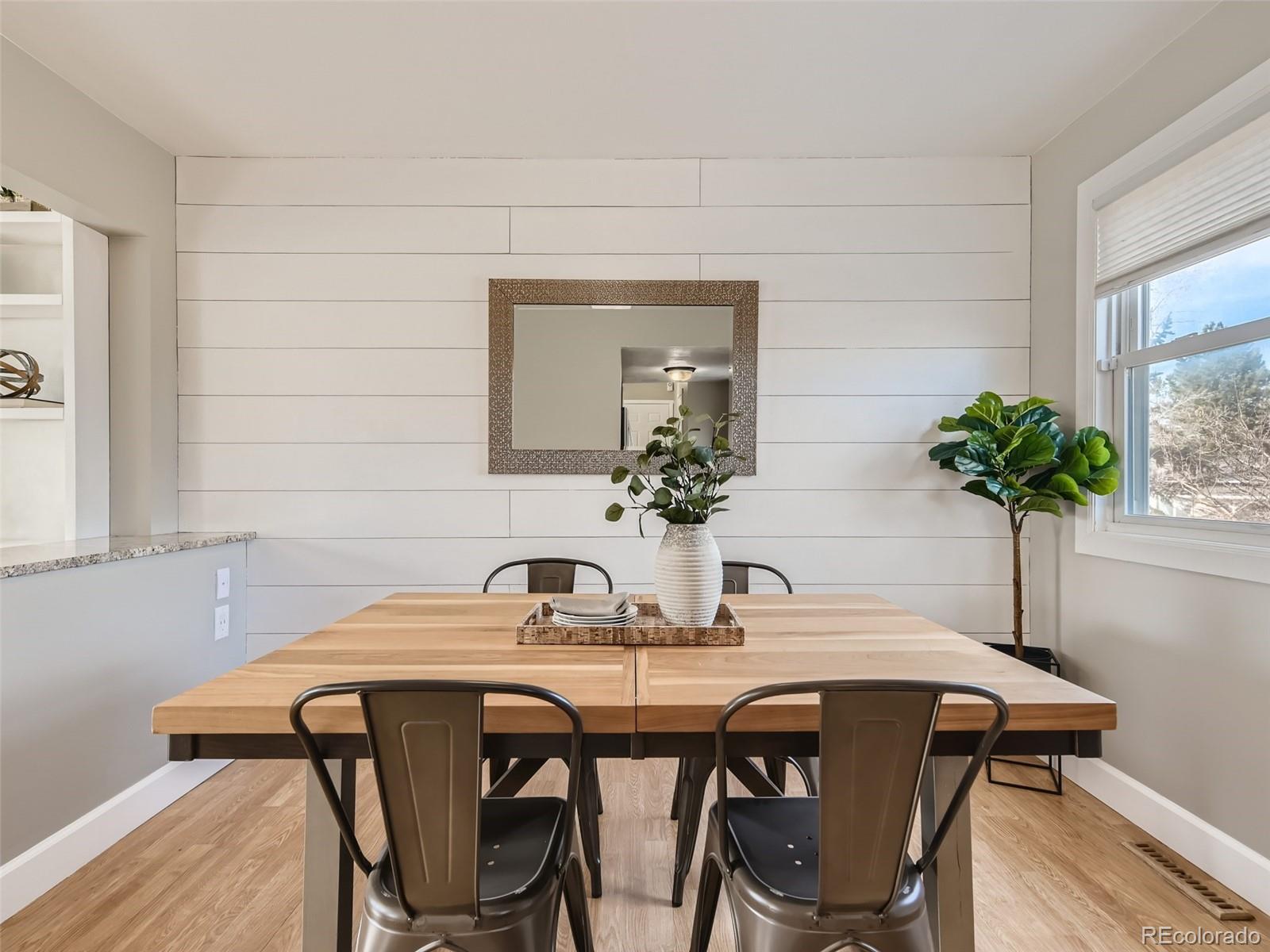 10390 Owens Circle Westminster, CO 80021 - Photo 8 of 28 a dining room with furniture and window