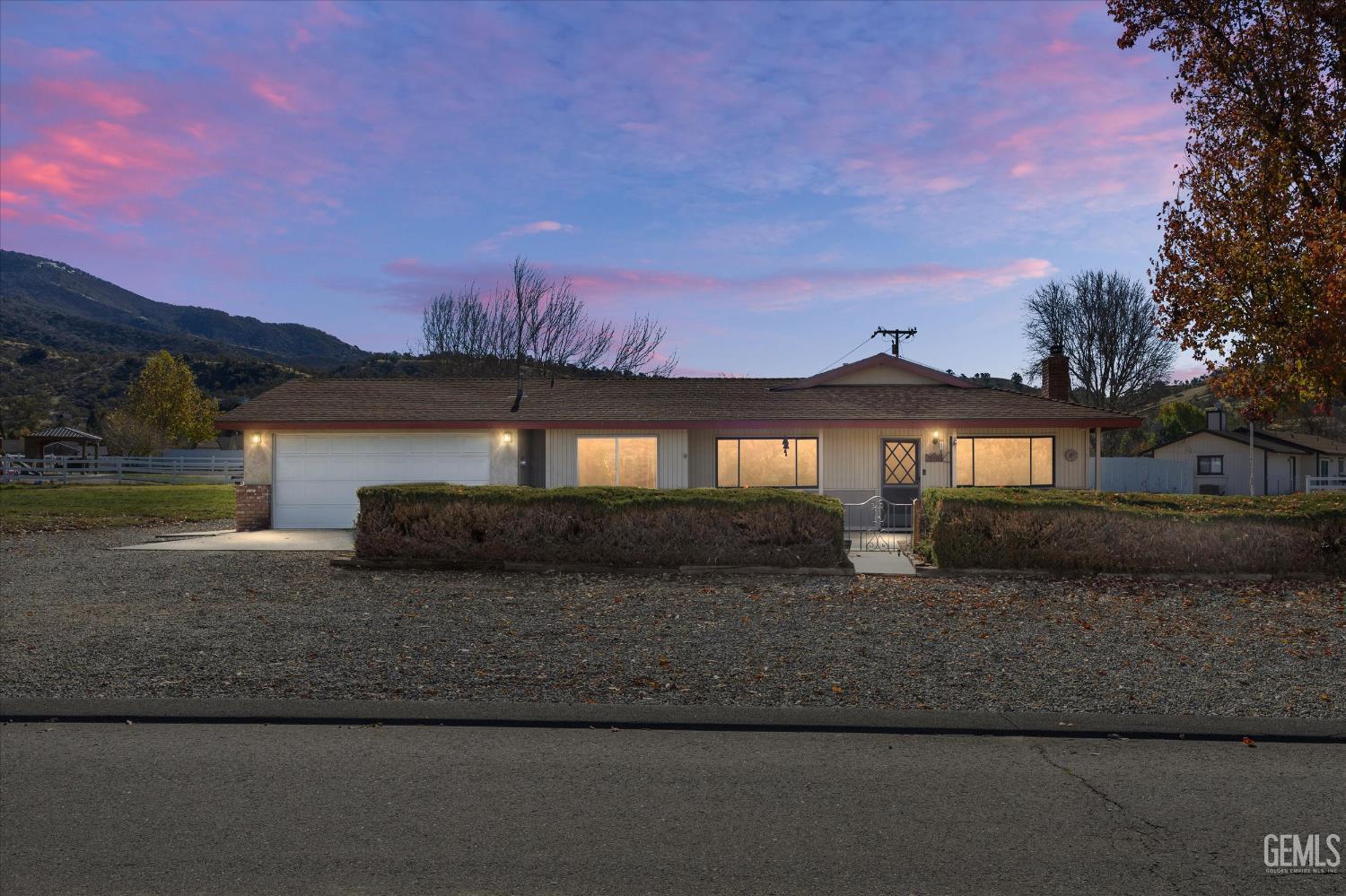 Undisclosed Address Tehachapi, CA 93561 - Photo 1 of 40 a front view of a house with a yard