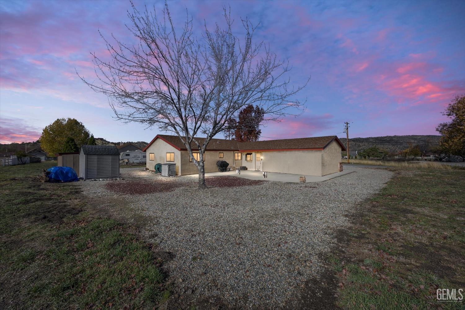 Undisclosed Address Tehachapi, CA 93561 - Photo 2 of 40 a view of a house with a yard