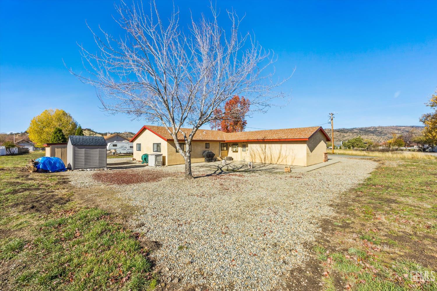 Undisclosed Address Tehachapi, CA 93561 - Photo 32 of 40 a view of a house with a yard