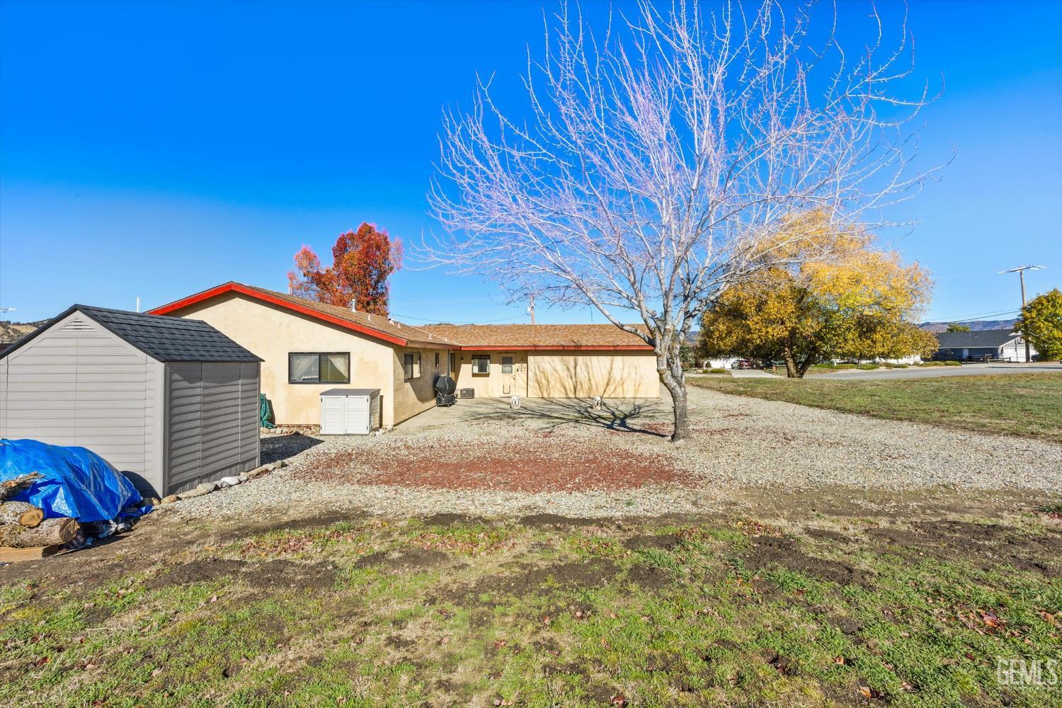 Undisclosed Address Tehachapi, CA 93561 - Photo 34 of 40 a front view of a house with a yard