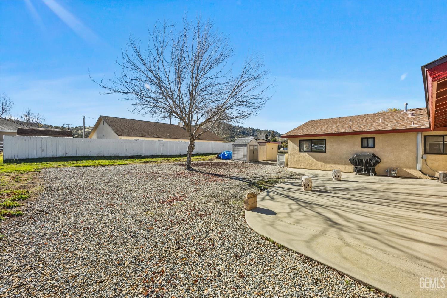 Undisclosed Address Tehachapi, CA 93561 - Photo 36 of 40 a front view of a house with garden