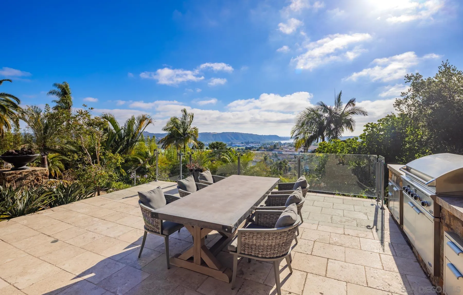2647 Marmol Court Carlsbad, CA 92009 - Photo 13 of 35 a terrace with outdoor seating and trees