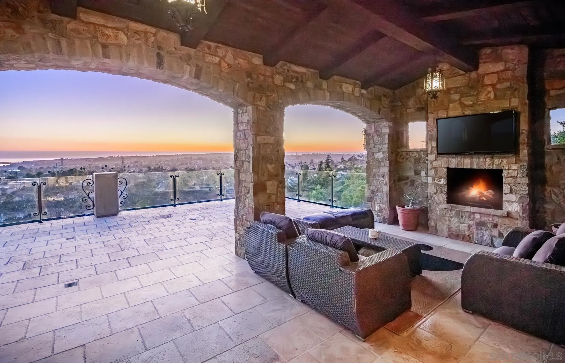 2647 Marmol Court Carlsbad, CA 92009 - Photo 17 of 35 a living room with furniture and a fireplace