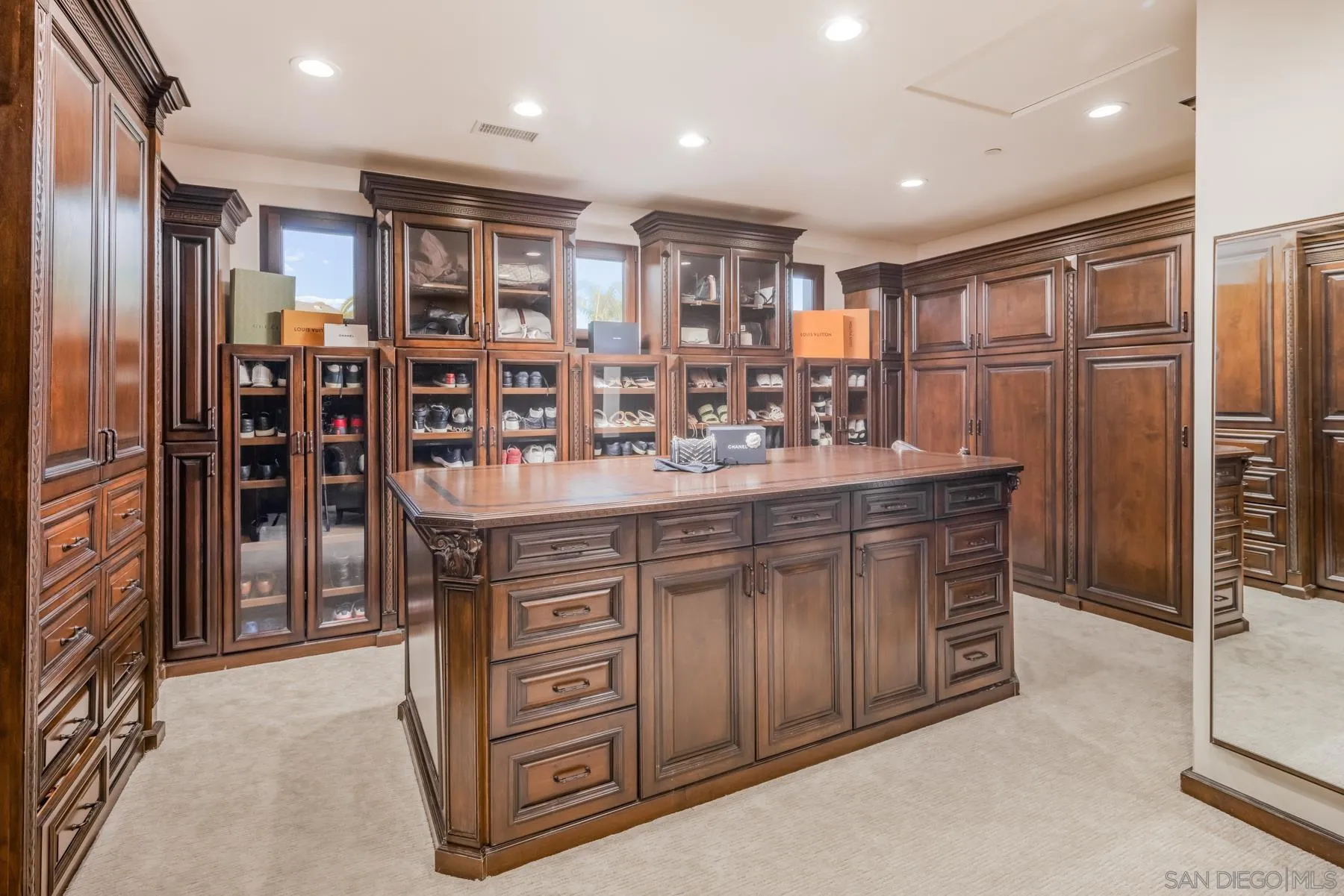 2647 Marmol Court Carlsbad, CA 92009 - Photo 20 of 35 a kitchen with stainless steel appliances granite countertop a refrigerator and a sink
