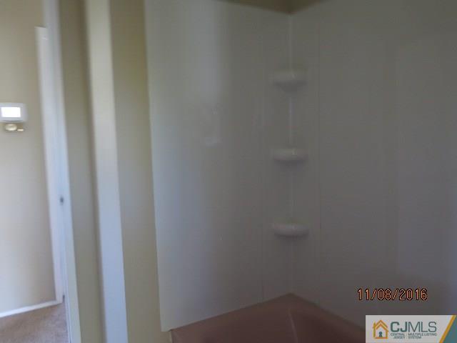27 Clemson Road Old Bridge, NJ 08859 - Photo 9 of 18 a small space with a window